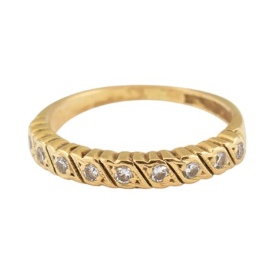 Lot 406 - HALLMARKED 18CT GOLD & DIAMOND ETERNITY RING