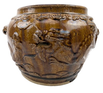 Lot 173 - QING BROWN GLAZED STONEWARE POTTERY JAR 清 黄釉龙纹罐
