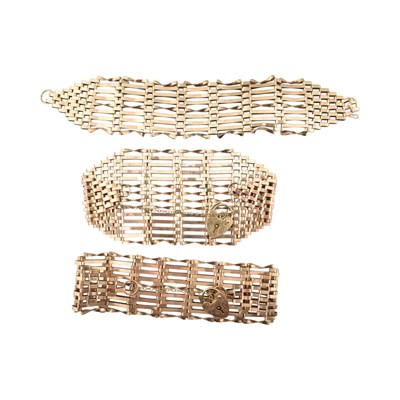 Lot 401 - THREE 1970S HALLMARKED 9CT GOLD GATE LINK BRACELETS