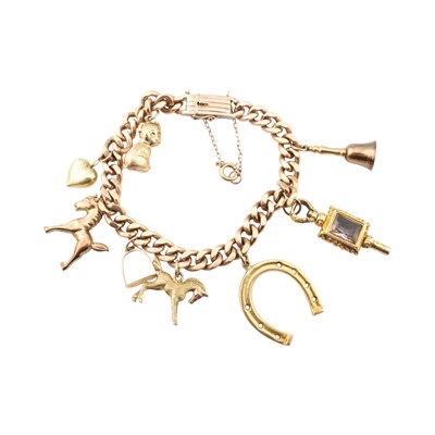 Lot 391 - 9CT GOLD CHARM BRACELET