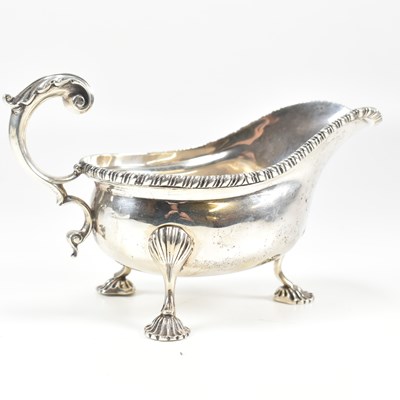 Lot 170 - GEORGE V HALLMARKED SILVER GRAVY / SAUCE BOAT