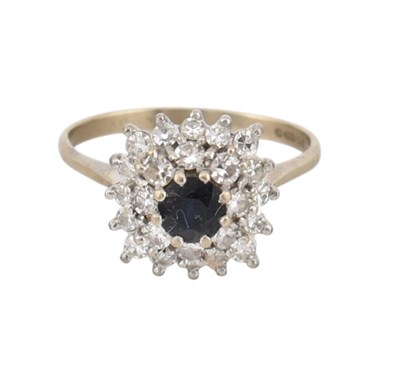 Lot 333 - HALLMARKED 18CT WHITE GOLD SAPPHIRE & DIAMOND CLUSTER RING