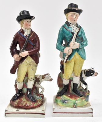 Lot 137 - TWO EARLY STAFFORDSHIRE PEARLWARE FIGURINES OF HUNTSMEN