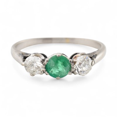Lot 47 - EMERALD & DIAMOND THREE STONE RING