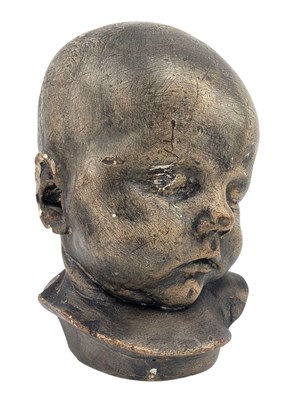 Lot 12 - 20TH CENTURY PLASTER WORKED SCULPTURE OF A BABY'S HEAD