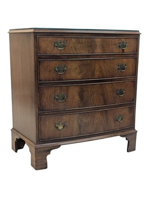 Lot 957 - GEORGE III REVIVAL WALNUT CHEST OF DRAWERS