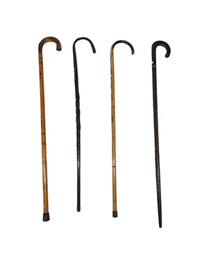 Lot 223 - COLLECTION OF FOUR SHEPHERD'S CROOK WALKING STICKS