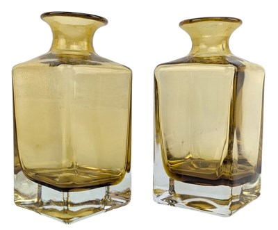 Lot 119 - PAIR OF EARLY 20TH CENTURY YELLOW & CLEAR GLASS DECANTER BOTTLES