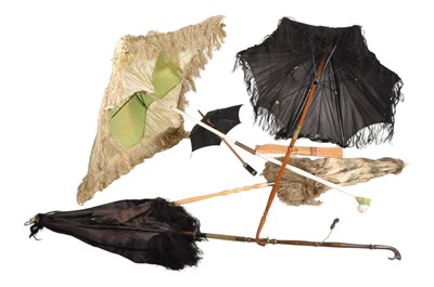 Lot 248 - FOUR LATE 19TH / EARLY 20TH CENTURY FOLDING PARASOL UMBRELLAS