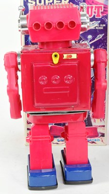 Lot 704 - TINPLATE TOYS - X2 TAIWAN SJM SUPER ASTRONAUT ROBOTS