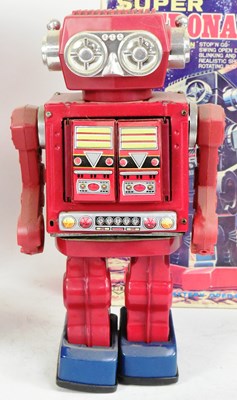 Lot 704 - TINPLATE TOYS - X2 TAIWAN SJM SUPER ASTRONAUT ROBOTS