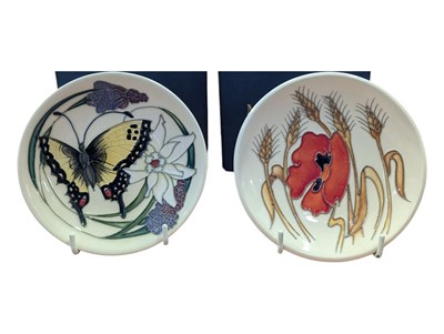 Lot 44 - MOORCROFT - TWO 2009 21ST CENTURY BOXED CERAMIC PIN DISHES