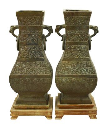Lot 106 - PAIR OF HEAVY EARLY 20TH CENTURY CHINESE ARCHAIC STYLE BRONZE HU VASES