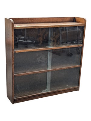 Lot 617 - MANNER OF HERBERT GIBBS FURNITURE - MID CENTURY OAK BOOKCASE CABINET