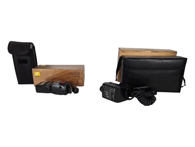 Lot 276 - NIKON - TWO 21ST CENTURY SPEEDLIGHT FLASHES HOUSED IN THE ORIGINAL BOXES