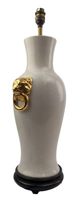 Lot 107 - LARGE VINTAGE CRACKLE GLAZED LAMP WITH GILT LION HANDLES
