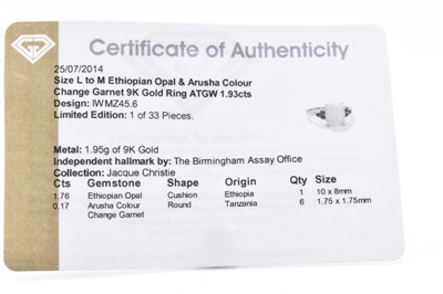 Lot 240 - HALLMARKED 9CT GOLD ETHIOPIAN OPAL & ARUSHA COLOUR CHANGE GARNET RING