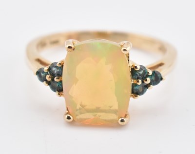 Lot 240 - HALLMARKED 9CT GOLD ETHIOPIAN OPAL & ARUSHA COLOUR CHANGE GARNET RING