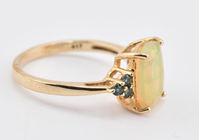 Lot 240 - HALLMARKED 9CT GOLD ETHIOPIAN OPAL & ARUSHA COLOUR CHANGE GARNET RING