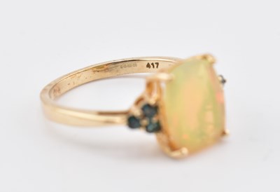 Lot 240 - HALLMARKED 9CT GOLD ETHIOPIAN OPAL & ARUSHA COLOUR CHANGE GARNET RING