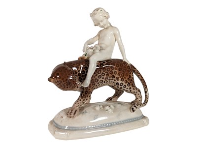 Lot 94 - MANNER OF KARL TUTTER (1883 - 1969) - 20TH CENTURY PORCELAIN GIRL ON LEOPARD FIGURE