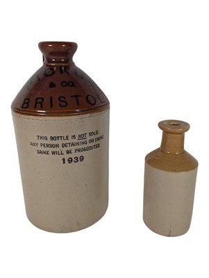 Lot 106 - TWO EARLY 20TH CENTURY STONEWARE BRISTOL FLAGON / JUGS