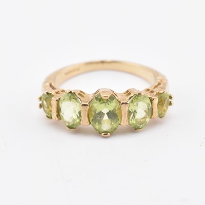 Lot 202 - HALLMARKED 9CT GOLD & PERIDOT FIVE STONE RING