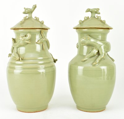 Lot 168 - PAIR OF LONGQUAN CELADON CERAMIC URNS 龙泉 青釉贴花龙虎尊 一对