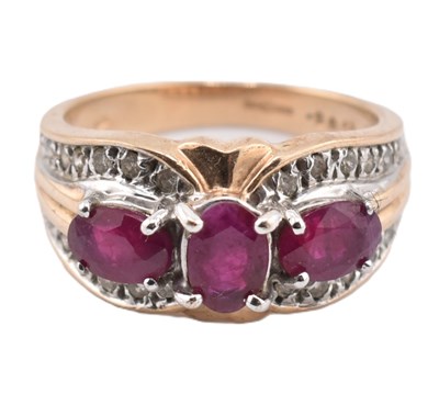 Lot 187 - HALLMARKED 9CT GOLD RUBY & DIAMOND THREE STONE RING