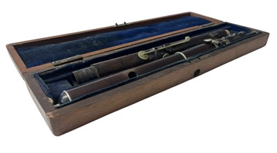 Lot 120 - ROSEWOOD TWO SECTION FLUTE BY BOOSEY & CO REGENT STREET LONDON