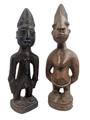 Lot 88 - TWO WEST AFRICAN NIGERIAN YORUBA IBEJI CARVED WOOD FIGURES