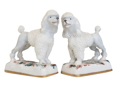 Lot 133 - PAIR OF 19TH CENTURY STAFFORDSHIRE POODLE DOG FIGURINES