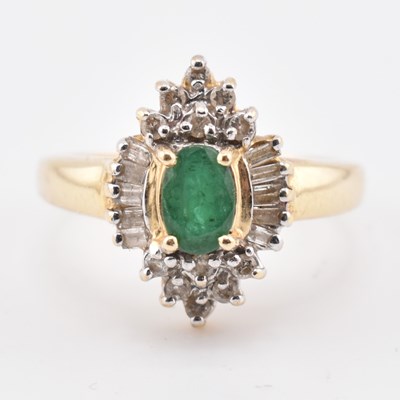 Lot 232 - 14CT GOLD EMERALD & DIAMOND HALO CLUSTER RING