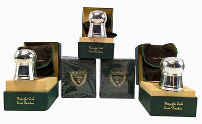 Lot 224 - FIVE CHRISOFLE & DOM PERIGNON SILVER PLATED CHAMPAGNE KEEPSAKE CORKS IN PRESENTATION BOXES
