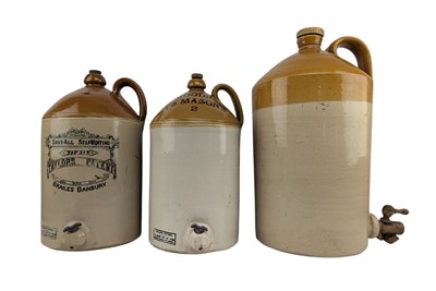 Lot 129 - THREE VINTAGE LARGE TWO TONE STONEWARE FLAGONS WITH HANDLES