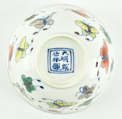 Lot 42 - MING CHENGHUA MARK DOUCAI BUTTERFLY TEA BOWL 明成化款斗彩蝴蝶茶碗