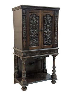 Lot 949 - 19TH CENTURY VICTORIAN CARVED FRONT MAHOGANY CABINET ON STAND