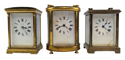 Lot 35 - THREE 20TH CENTURY BRASS CARRIAGE CLOCKS INCLUDING T & E RHODES F KENDAL