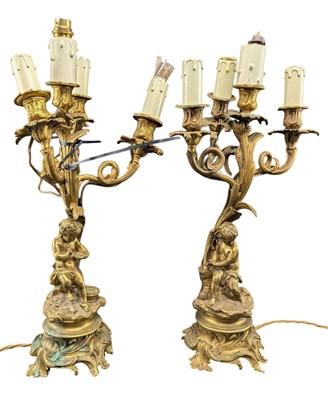 Lot 483 - PAIR OF FRENCH ROCOCO STYLE LATE 19TH CENTURY BRASS CHERUBS & TREE TABLE LAMPS