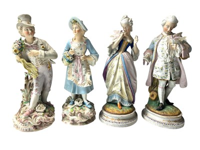 Lot 23 - TWO PAIRS OF CONTINENTAL 19TH CENTURY BISQUE FIGURINES T/W ANOTHER PAIR (4)
