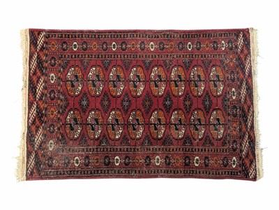 Lot 1103 - 20TH CENTURY BOKHARA WOOL RUG