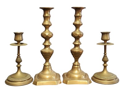 Lot 271 - TWO PAIRS OF 19TH CENTURY VICTORIAN BRASS CANDLESTICK HOLDERS