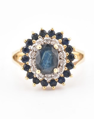 Lot 222 - HALLMARKED 18CT GOLD SAPPHIRE & DIAMOND CLUSTER RING