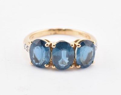 Lot 323 - HALLMARKED 9CT GOLD ORISSA KYANITE & WHITE ZIRCON RING