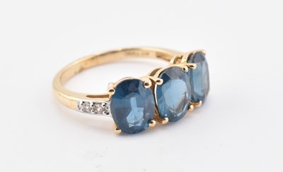 Lot 323 - HALLMARKED 9CT GOLD ORISSA KYANITE & WHITE ZIRCON RING