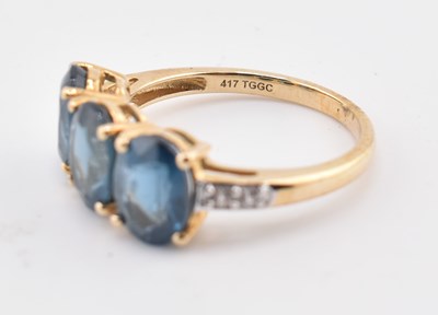 Lot 323 - HALLMARKED 9CT GOLD ORISSA KYANITE & WHITE ZIRCON RING