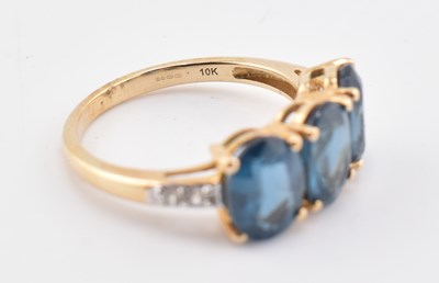 Lot 323 - HALLMARKED 9CT GOLD ORISSA KYANITE & WHITE ZIRCON RING