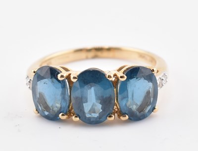 Lot 323 - HALLMARKED 9CT GOLD ORISSA KYANITE & WHITE ZIRCON RING