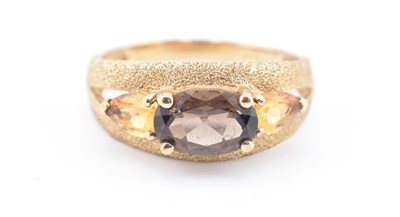 Lot 317 - HALLMARKED 9CT GOLD SMOKY QUARTZ & CITRINE STARDUST RING