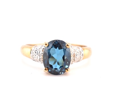 Lot 312 - HALLMARKED 9CT GOLD LONDON BLUE TOPAZ & DIAMOND RING